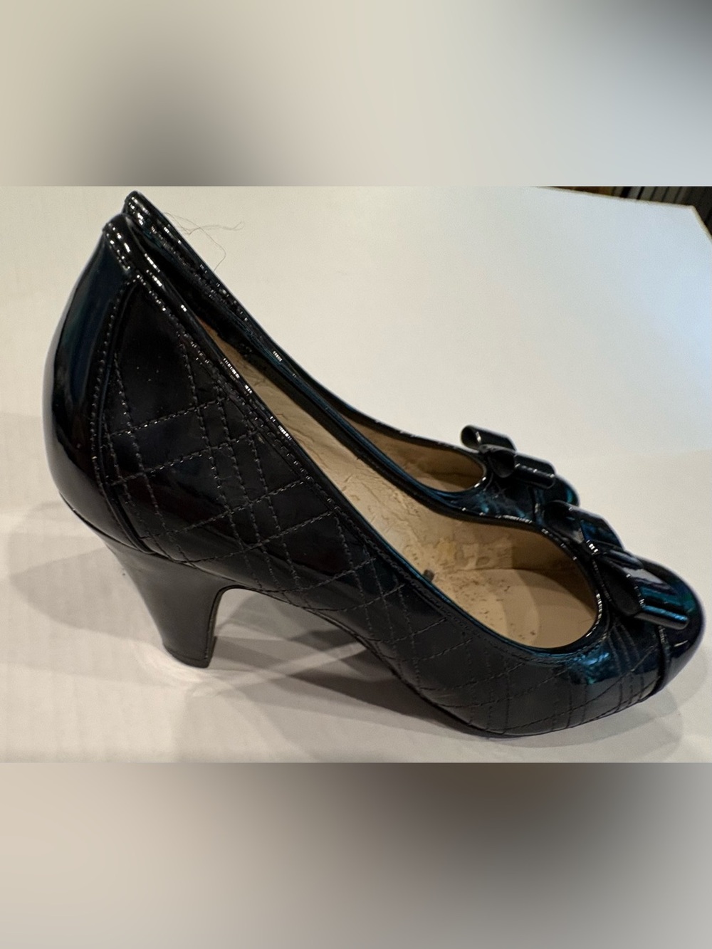 Patent Quilted Black Mid-Heel Pump with Bow Accent